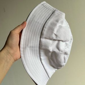 White bucket hat